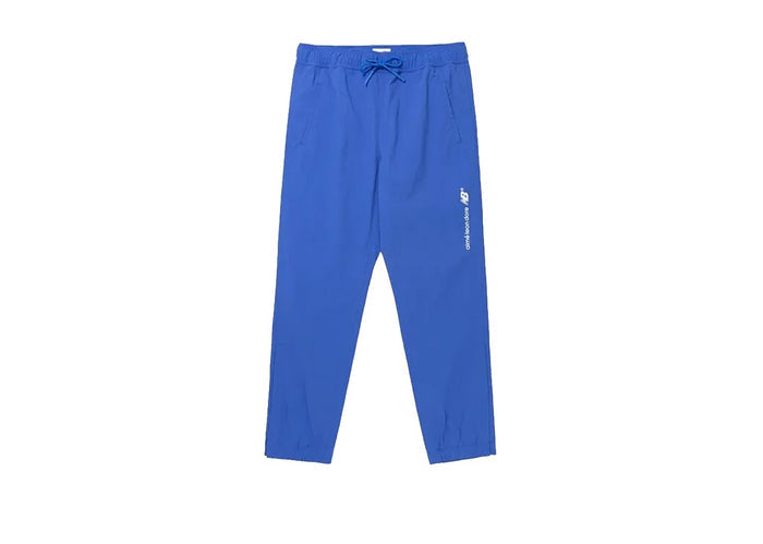 AIME LEON DORE x NEW BALANCE BLUE NYLON TRACK PANTS