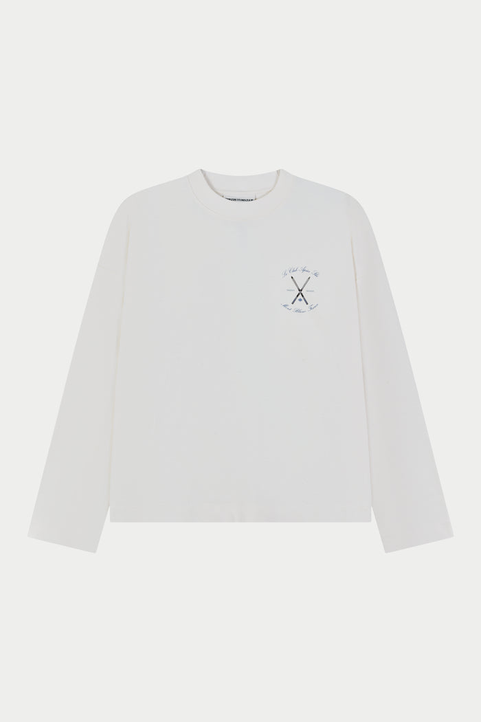 White long-sleeve shirt with a small logo on a light grey background