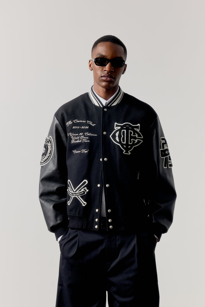 MULTI BADGE VARSITY JACKET - BLACK