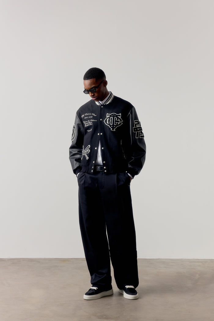 MULTI BADGE VARSITY JACKET - BLACK